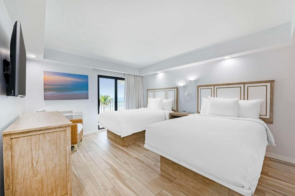 One-Bedroom Double Suite with Two Double Beds, Sofa Bed, Balcony and Gulf View - Non-Smoking interior